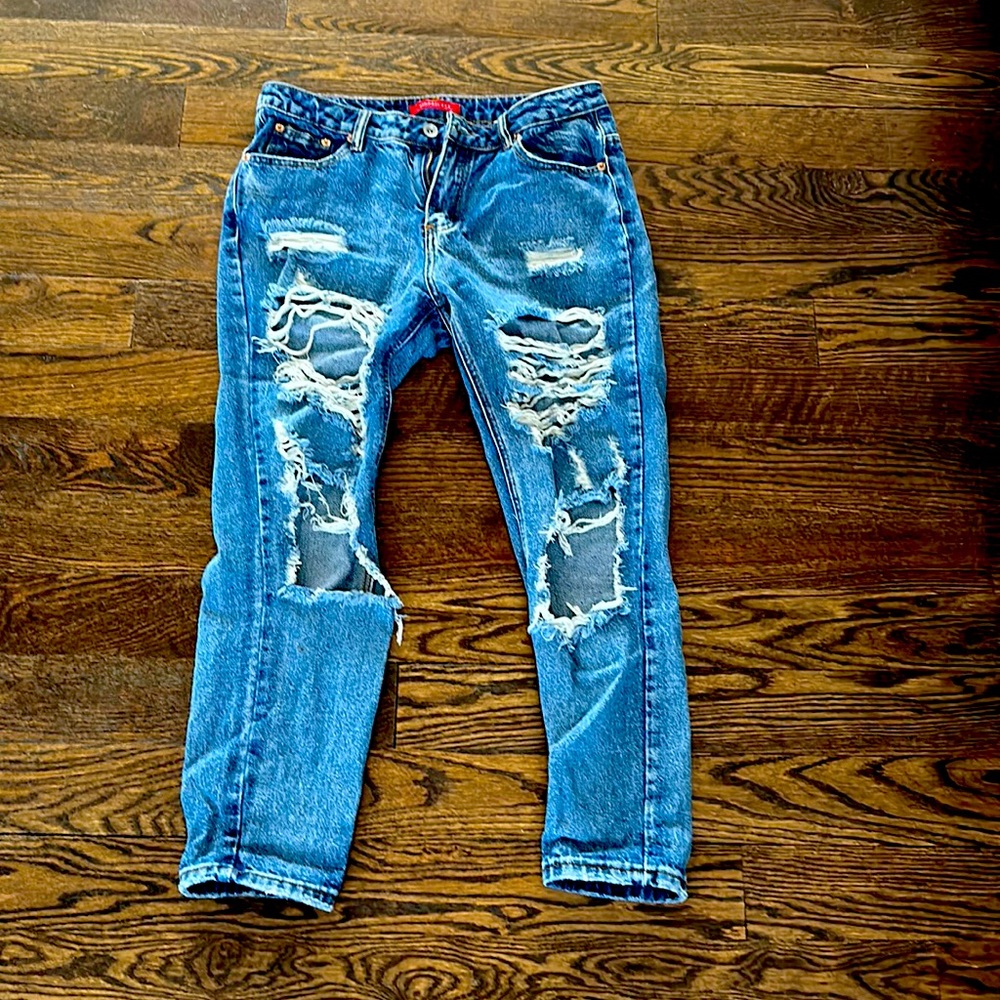 Blue jeans. In great condition. Only worn a few times. Has a nice rip design